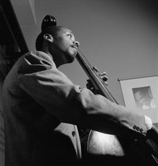 Portrait of John Simmons, William P. Gottlieb's office, New York, N.Y., ca. July 1947. Creator: William Paul Gottlieb