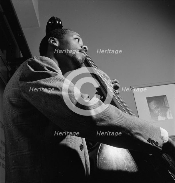 Portrait of John Simmons, William P. Gottlieb's office, New York, N.Y., ca. July 1947. Creator: William Paul Gottlieb.