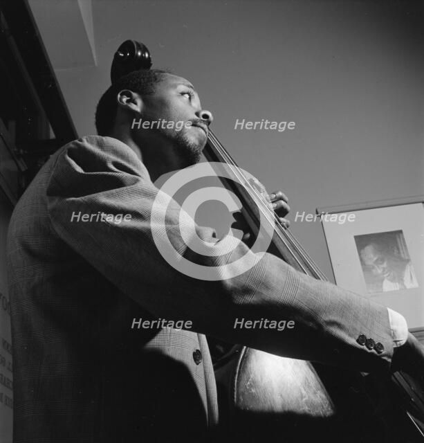 Portrait of John Simmons, William P. Gottlieb's office, New York, N.Y., ca. July 1947. Creator: William Paul Gottlieb.