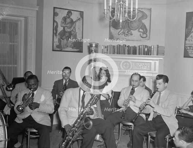 Portrait of Johnny Hodges, Rex William Stewart...Turkish Embassy, Washington, D.C., 1930. Creator: William Paul Gottlieb.