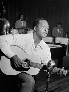 Portrait of Josh White, Café Society (Downtown), New York, N.Y., ca. June 1946. Creator: William Paul Gottlieb