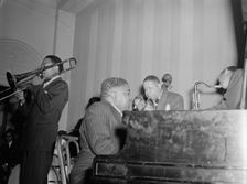 Portrait of Jay Higginbotham, Pete Johnson, Henry Allen, and Lester Young... Washington, D.C., c1940 Creator: William Paul Gottlieb