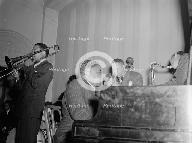Portrait of Jay Higginbotham, Pete Johnson, Henry Allen, and Lester Young... Washington, D.C., c1940 Creator: William Paul Gottlieb.