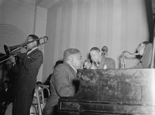 Portrait of Jay Higginbotham, Pete Johnson, Henry Allen, and Lester Young... Washington, D.C., c1940 Creator: William Paul Gottlieb