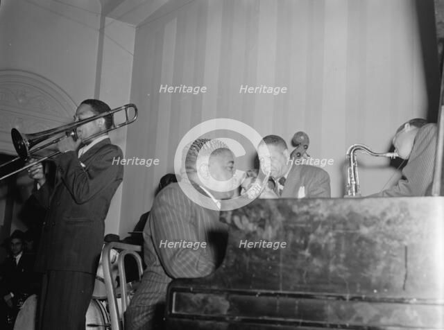 Portrait of Jay Higginbotham, Pete Johnson, Henry Allen, and Lester Young... Washington, D.C., c1940 Creator: William Paul Gottlieb.
