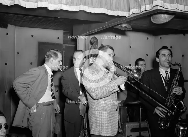 Portrait of Jack Teagarden, Bill Harris, Dave Tough, and Charlie Ventura, Three Deuces, N.Y., 1946. Creator: William Paul Gottlieb.