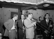 Portrait of Jack Teagarden, Bill Harris, Dave Tough, and Charlie Ventura, Three Deuces, N.Y., 1946. Creator: William Paul Gottlieb