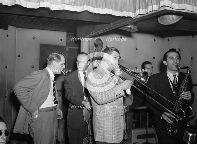 Portrait of Jack Teagarden, Bill Harris, Dave Tough, and Charlie Ventura, Three Deuces, N.Y., 1946. Creator: William Paul Gottlieb.