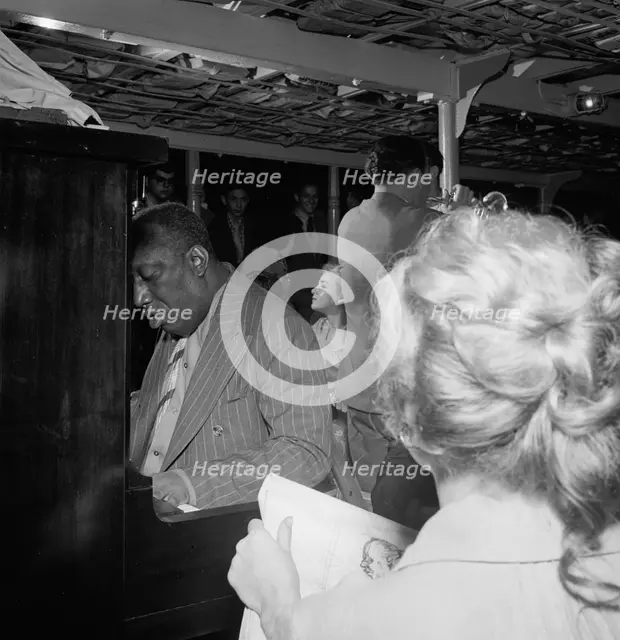 Portrait of James P. (James Price) Johnson and Marty Marsala, Riverboat on the Hudson, N.Y., 1947. Creator: William Paul Gottlieb.