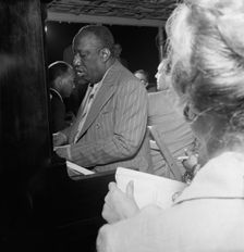 Portrait of James P. (James Price) Johnson, Riverboat on the Hudson, N.Y., ca. July 1947. Creator: William Paul Gottlieb