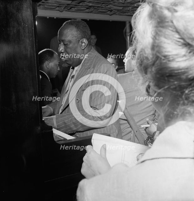 Portrait of James P. (James Price) Johnson, Riverboat on the Hudson, N.Y., ca. July 1947. Creator: William Paul Gottlieb.