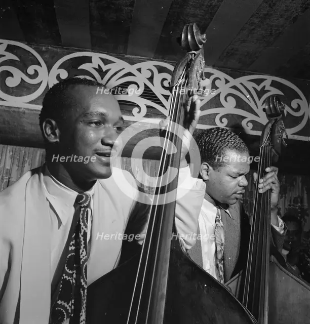 Portrait of Oscar Pettiford and Junior Raglin, Aquarium, New York, N.Y., ca. Nov. 1946. Creator: William Paul Gottlieb.
