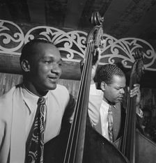 Portrait of Oscar Pettiford and Junior Raglin, Aquarium, New York, N.Y., ca. Nov. 1946. Creator: William Paul Gottlieb