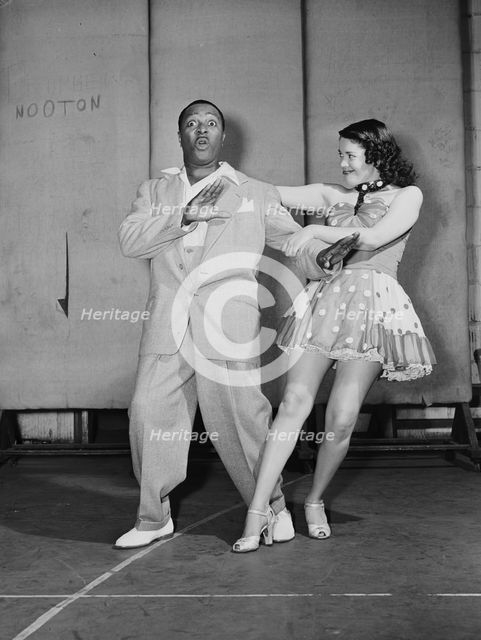 Portrait of Louis Jordan, Paramount Theater(?), New York, N.Y., ca. July 1946. Creator: William Paul Gottlieb.