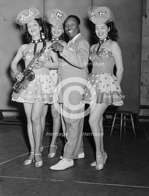 Portrait of Louis Jordan, Paramount Theater(?), New York, N.Y., ca. July 1946. Creator: William Paul Gottlieb.