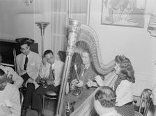 Portrait of Lawrence Brown, Johnny Hodges, and Adele Girard, Turkish Embassy, Washington, D.C., 1930 Creator: William Paul Gottlieb