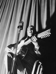 Portrait of Leadbelly, National Press Club, Washington, D.C., 1938. Creator: William Paul Gottlieb