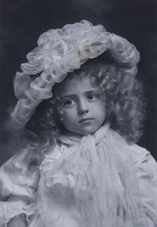 Portrait of little girl in frilly hat, c1900. Creator: Addie Kilburn Robinson