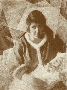 Portrait of Liubov Popova with her son in her studio, 1919. Creator: Anon