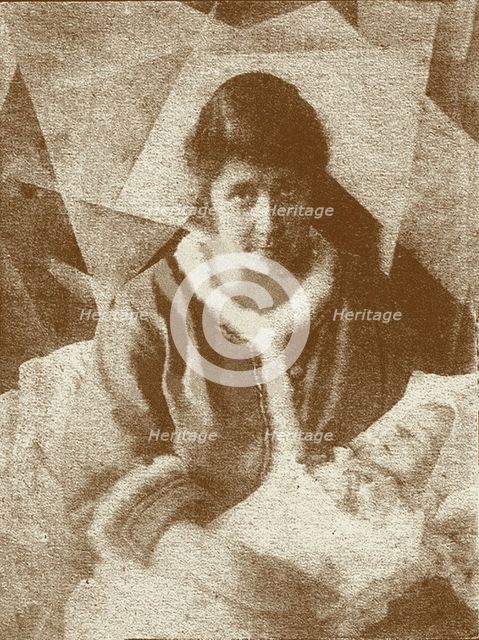 Portrait of Liubov Popova with her son in her studio, 1919. Creator: Anon.