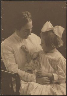 Portrait of Mother and Child with Big Bow, 1907-1924. Creator: Louis Fleckenstein