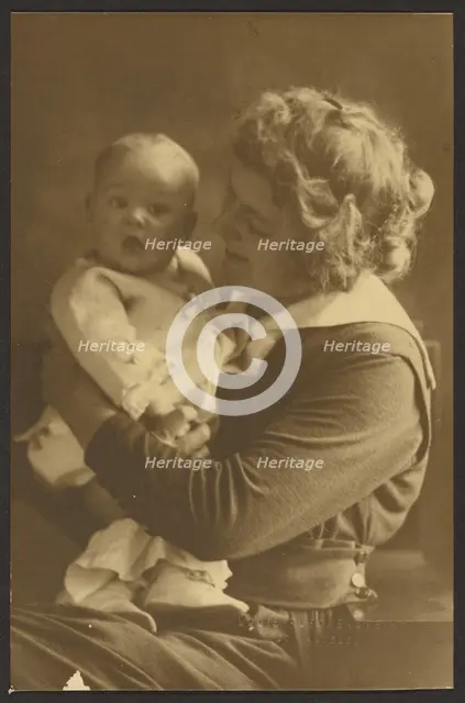 Portrait of Mother Smiling at Child, 1907-1924. Creator: Louis Fleckenstein.