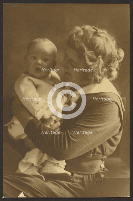 Portrait of Mother Smiling at Child, 1907-1924. Creator: Louis Fleckenstein.