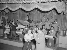 Portrait of Machito, Graciella Grillo, and Mario Bouza, Glen Island Casino, New York, 1947. Creator: William Paul Gottlieb