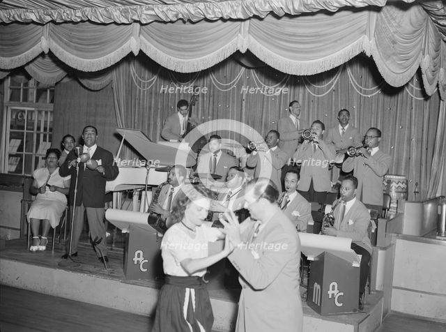 Portrait of Machito, Graciella Grillo, and Mario Bouza, Glen Island Casino, New York, 1947. Creator: William Paul Gottlieb.