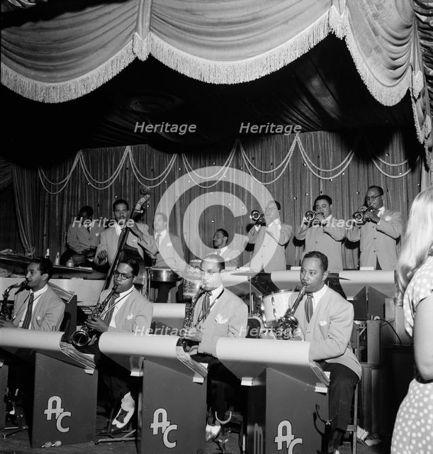 Portrait of Mario Bouza, Jose Mangual, Carlos Vidal(?), and Ubaldo...Glen Island Casino, N.Y., 1947. Creator: William Paul Gottlieb.
