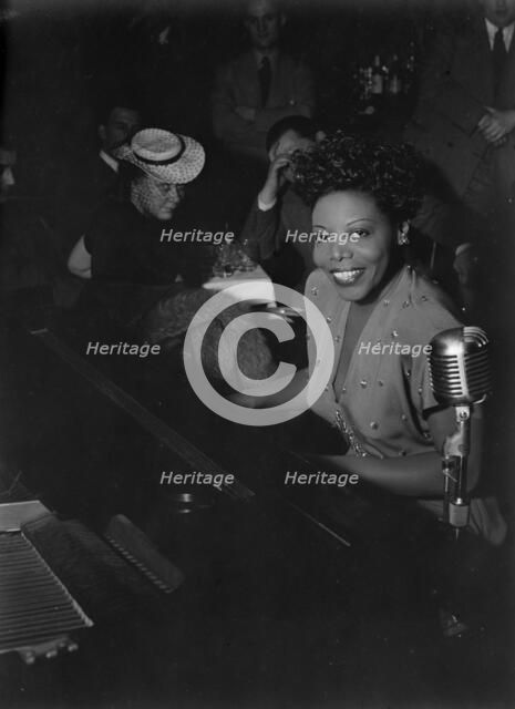 Portrait of Mary Lou Williams, Café Society (Downtown), New York, N.Y., ca. June 1947. Creator: William Paul Gottlieb.