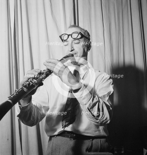 Portrait of Mezz Mezzrow in his office, New York, N.Y., ca. Nov. 1946. Creator: William Paul Gottlieb.