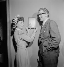 Portrait of Melvin G. Powell and Martha Scott in their home, Connecticut, ca. May 1947. Creator: William Paul Gottlieb