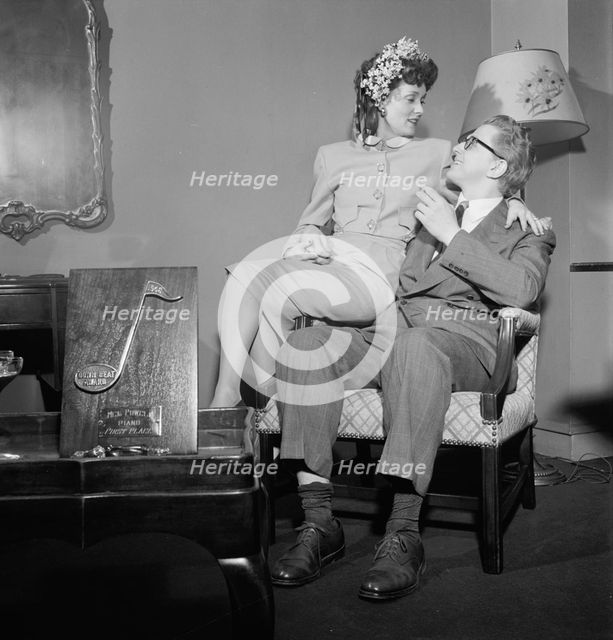 Portrait of Melvin G. Powell and Martha Scott in their home, Connecticut, ca. May 1947. Creator: William Paul Gottlieb.