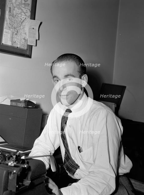 Portrait of Mike Levin, Down Beat office, New York, N.Y., ca. 1947. Creator: William Paul Gottlieb.