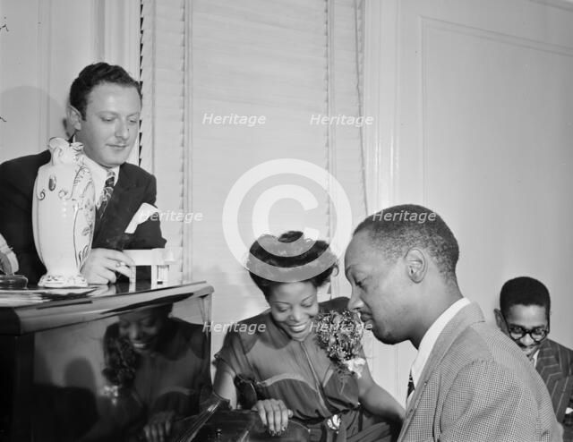 Portrait of Milt Orent, Mary Lou Williams, Hank Jones..., Mary Lou Williams' apartment...1947. Creator: William Paul Gottlieb.