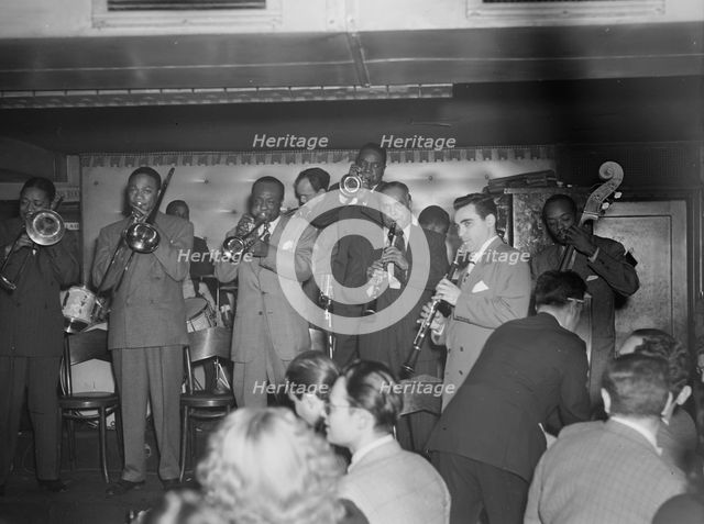Portrait of Sol (Solomon) Yaged, Jimmy Jones(?), and John (O.) Levy(?), Jimmy Ryan's..., N.Y., 1946. Creator: William Paul Gottlieb.