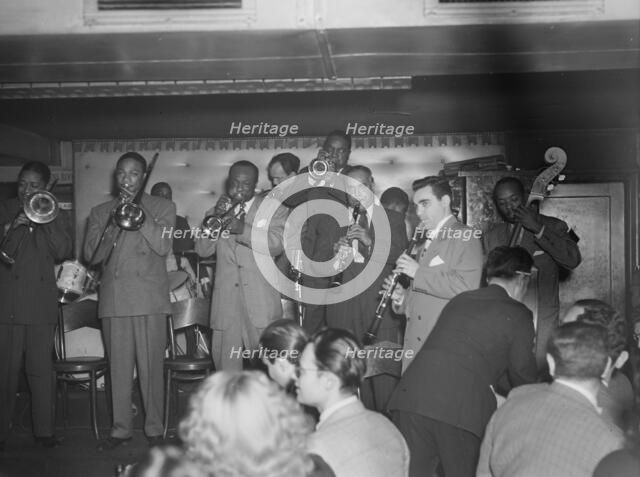 Portrait of Sol (Solomon) Yaged, Jimmy Jones(?), and John (O.) Levy(?), Jimmy Ryan's..., N.Y., 1946. Creator: William Paul Gottlieb.