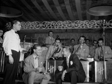 Portrait of Sam Donahue, Stan Kenton, Nick Callonus, and Hep, Aquarium, New York, N.Y., c.Dec. 1946. Creator: William Paul Gottlieb