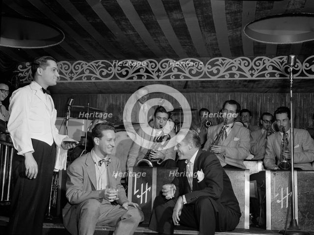 Portrait of Sam Donahue, Stan Kenton, Nick Callonus, and Hep, Aquarium, New York, N.Y., c.Dec. 1946. Creator: William Paul Gottlieb.