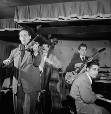 Portrait of Sam Hall Kaplan, Frenchy Cauette, Chuck Wayne, and Deryk Sampson, Three Deuces, NY, 1947 Creator: William Paul Gottlieb