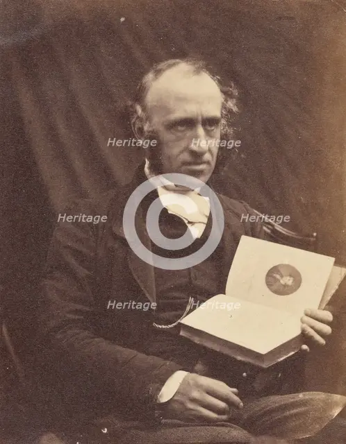 Portrait of Seated Man with a Book, 1870-1875. Creator: Unknown.