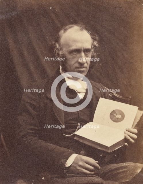 Portrait of Seated Man with a Book, 1870-1875. Creator: Unknown.