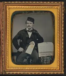 Portrait of seated man holding the Charleston Zeitung, possibly the owner of the newspaper..., 1853. Creator: Unknown