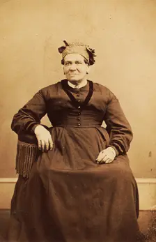 Portrait of seated woman wearing a headwrap, c1870. Creator: Thomas M Saurman