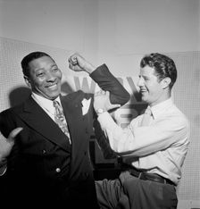 Portrait of Sid Catlett and Freddie Robbins, WOV office, New York, N.Y., ca. June 1947. Creator: William Paul Gottlieb