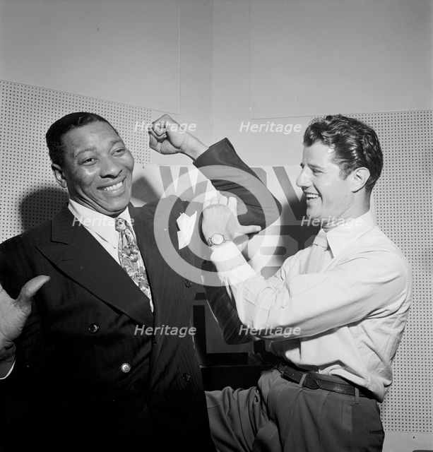 Portrait of Sid Catlett and Freddie Robbins, WOV office, New York, N.Y., ca. June 1947. Creator: William Paul Gottlieb.