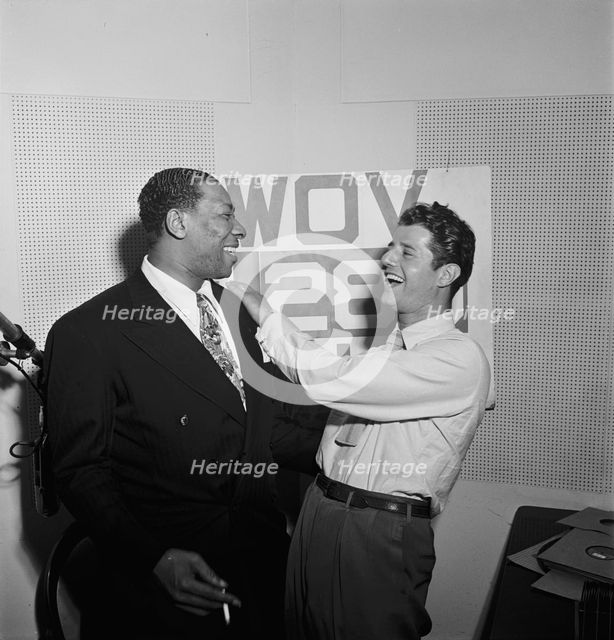 Portrait of Sid Catlett and Freddie Robbins, WOV office, New York, N.Y., ca. June 1947. Creator: William Paul Gottlieb.