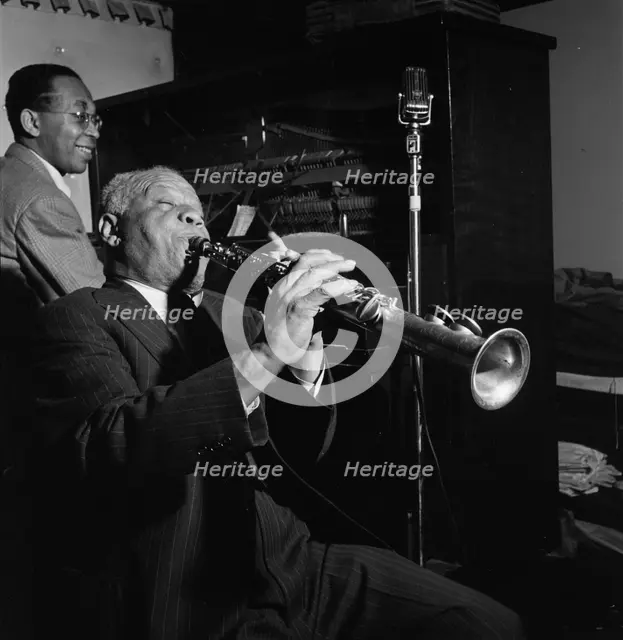 Portrait of Sidney Bechet and Lloyd Phillips, Jimmy Ryan's (Club), New York, N.Y., ca. June 1947. Creator: William Paul Gottlieb.
