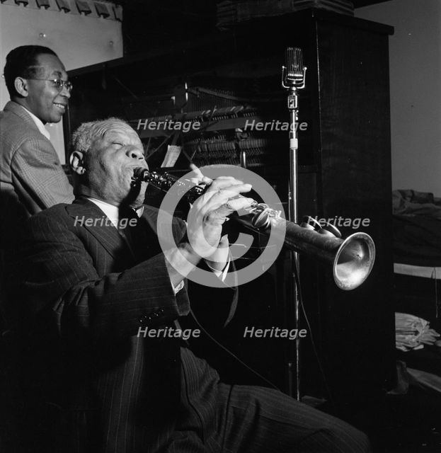 Portrait of Sidney Bechet and Lloyd Phillips, Jimmy Ryan's (Club), New York, N.Y., ca. June 1947. Creator: William Paul Gottlieb.